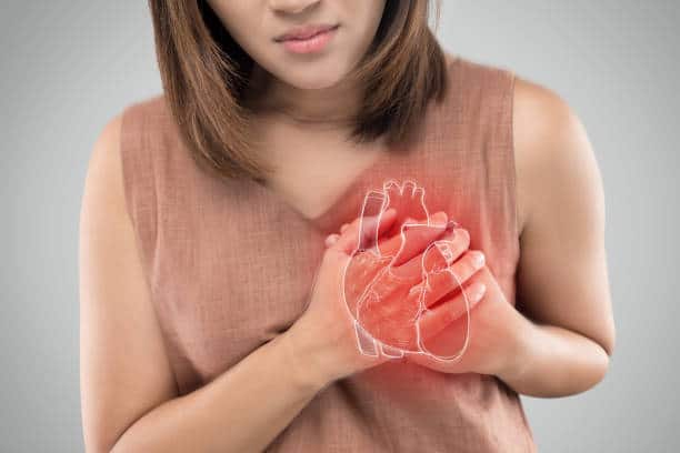 women enduring her heart disease