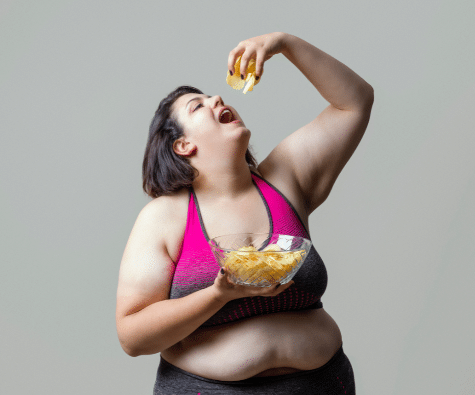 Obese woman eating food 