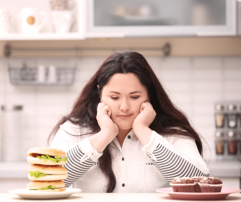Obese woman thinking what to eat 
