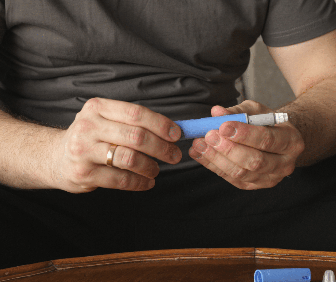 A guy holding a semaglutide
