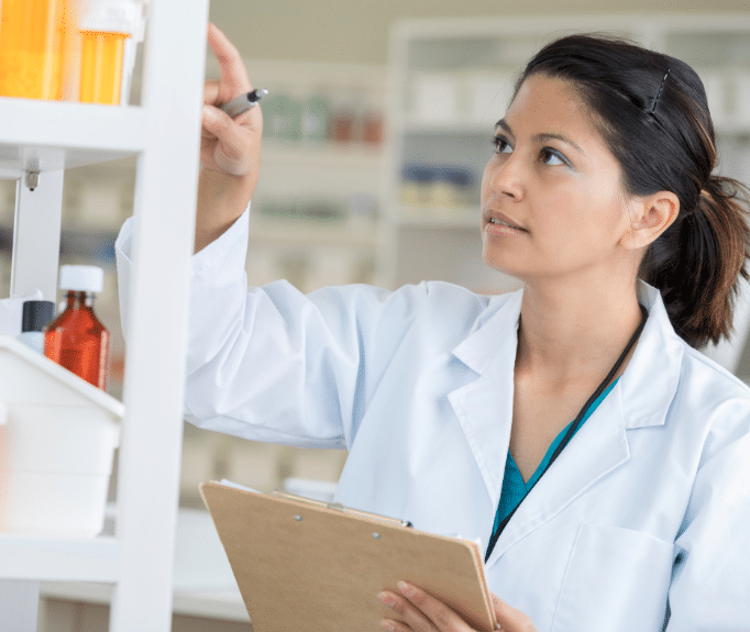 Pharmacist checking the medicines 